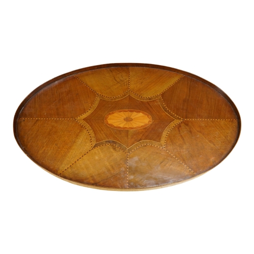 269 - An Edwardian oval patera inlaid mahogany tea tray, 65cm