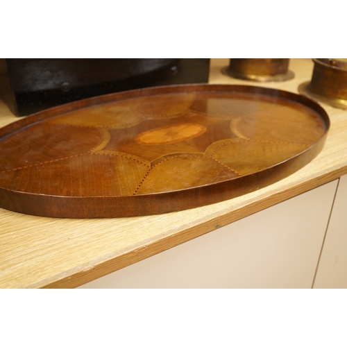 269 - An Edwardian oval patera inlaid mahogany tea tray, 65cm