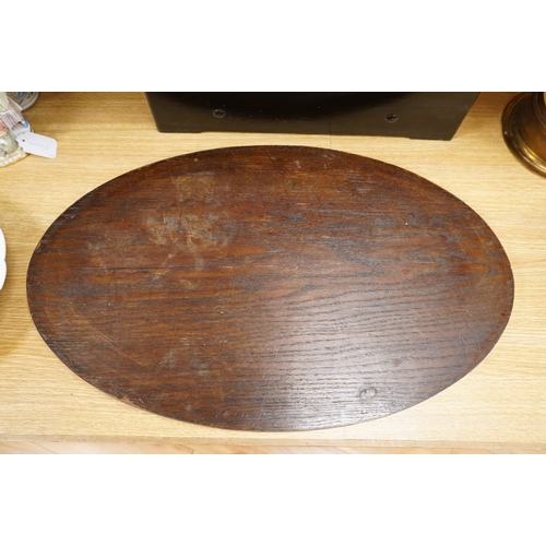 269 - An Edwardian oval patera inlaid mahogany tea tray, 65cm