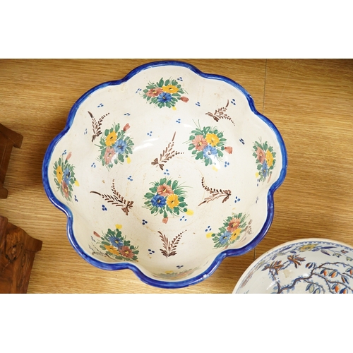 273 - An Italian maiolica punch bowl painted with flowers and masks,  and a Davenport Stone China punch bo... 