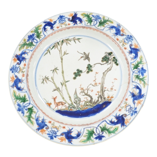 288 - A Chinese famille verte dish, Kangxi period, painted with deer and foliage, 39cm in diameter