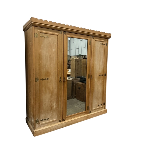 7 - A late Victorian Aesthetic Movement ash mirrored compactum wardrobe by Lamb of Manchester, width 200... 