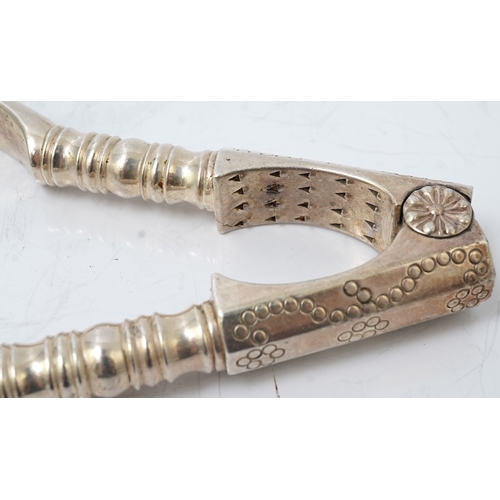 61 - A pair of George V silver nut crackers, by J Parkes & Co, with engraved multi ring decoration, Londo... 