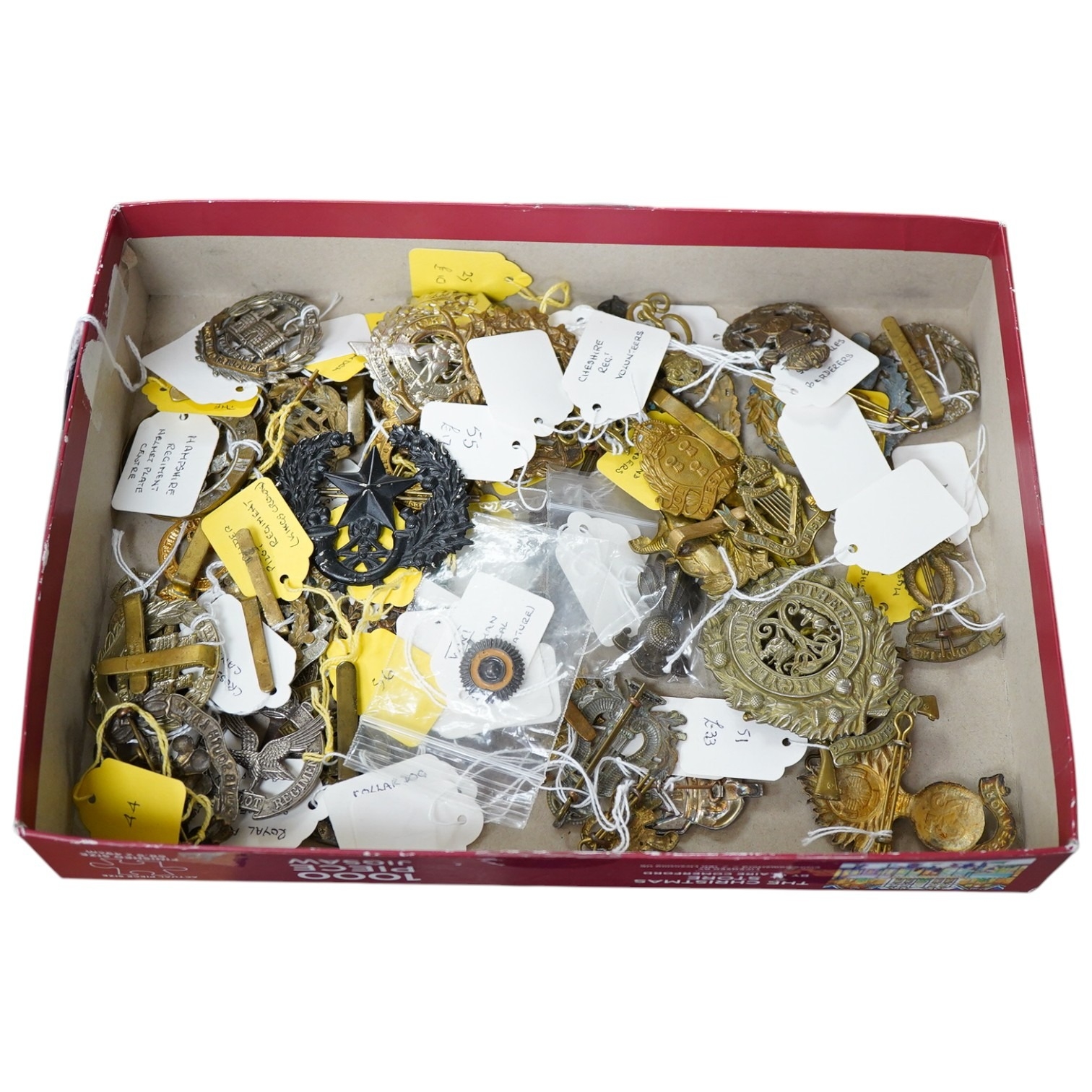 Forty military cap badges, parts and other related items, including ...
