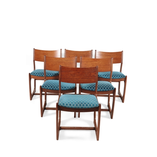 365 - Portwood Furniture of Stockport: A set of six teak dining chairs, circa 1970s, the frames of sleigh ... 