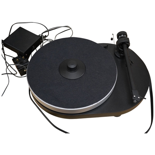 A Pro-ject RPM 4 turntable record player, fitted with an Ortofon 510 Mk ...