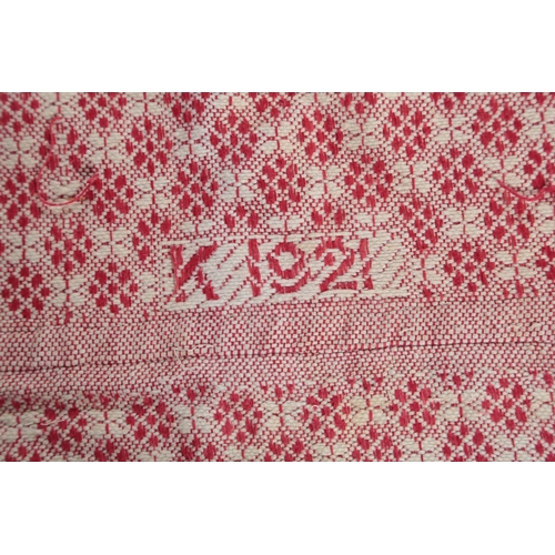 101 - A rare large White Star - Dominion central gartered, third class red and white woven cabin blanket, ... 