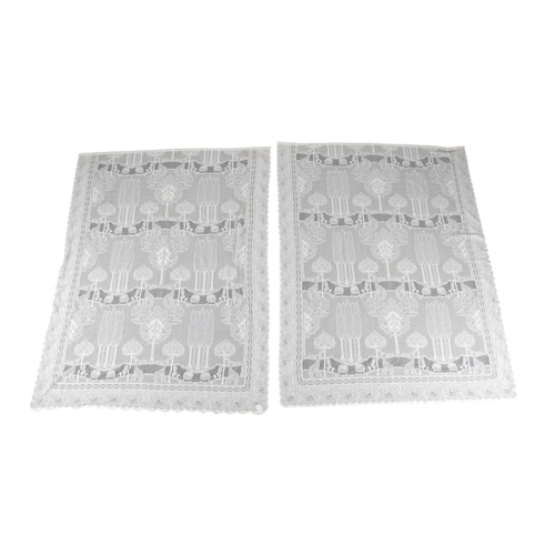 105 - The last pair of a collection of C. F. A. Voysey 'The Stag' design cream machine lace curtain panels... 