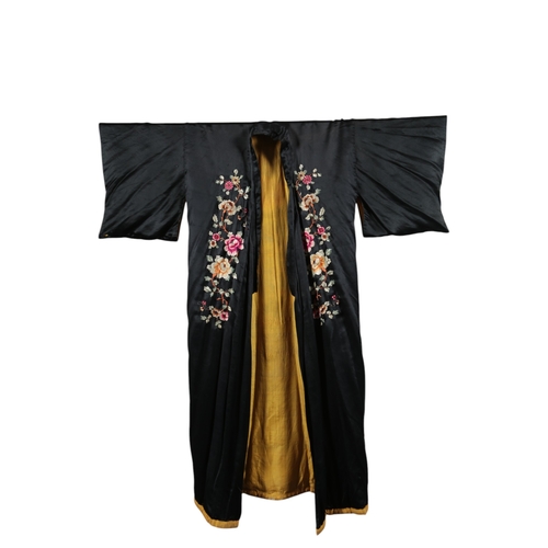 109 - A 1930's-40's Japanese black silk kimono, with multi-coloured floral embroidered front, back and sle... 