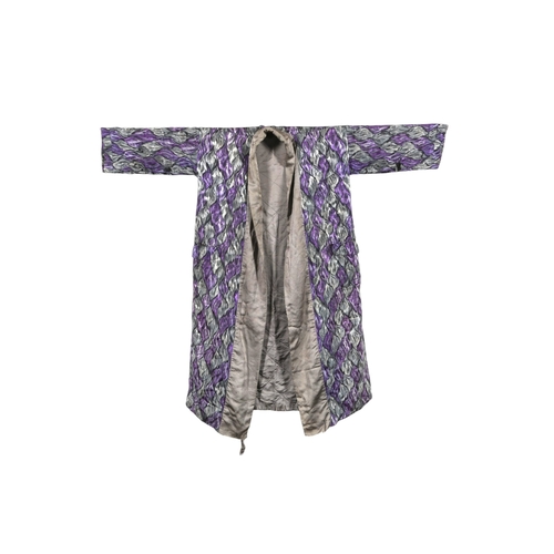 113 - An early 20th century large gentleman's dressing gown, made from purple and grey printed silk, with ... 