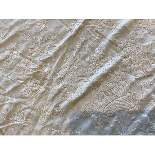 117 - An early 20th century Chinese cream on cream silk embroidered panel, 150cm x 154cm and a silk chiffo... 