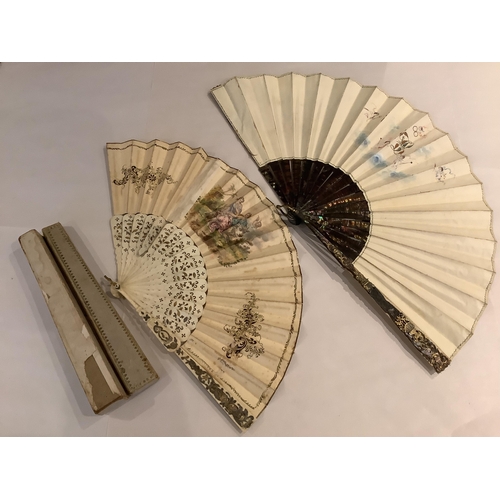 63 - A 19th century Spanish parchment and abalone fan the leaf painted with a figurative interior scene, ... 