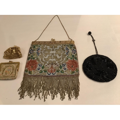 64 - A late 19th century micro steel beaded evening bag and three purses, the bag with beaded fringe, gil... 