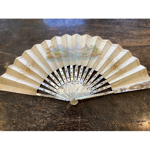 68 - A mother of pearl and sequin fan, another with painted figural leaf in a E T Piver, Paris box, a Caf... 