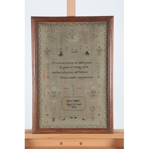 75 - A William IV embroidered sampler by Jane Miller, age 10 years, dated 1834. Worked on a fine linen gr... 