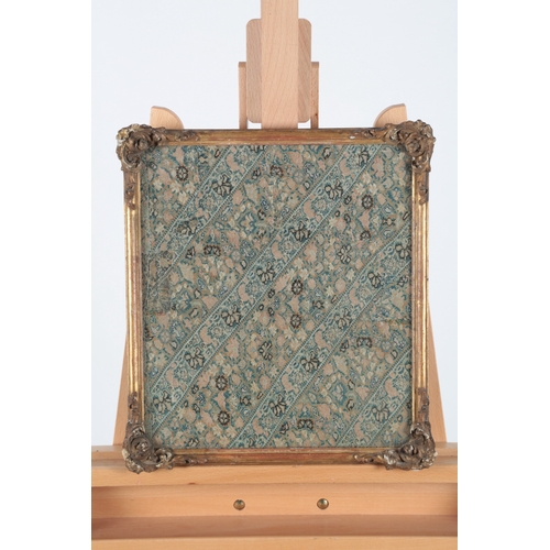 79 - An early to mid 19th century Persian finely needleworked framed panel. worked with mixed finely spun... 