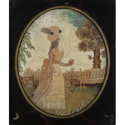 82 - Two George III framed silk female figural pastoral embroideries. One embroidered with a seated lady ... 