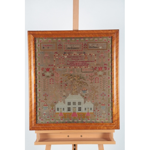 85 - A 19th century maple framed sampler by Jane S Aitken, dated 1856, embroidered with religious verse a... 
