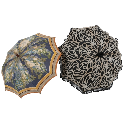 86 - An Edwardian black silk chiffon parasol, ornately appliquéd with cream silk ribboning, 92cm long, to... 