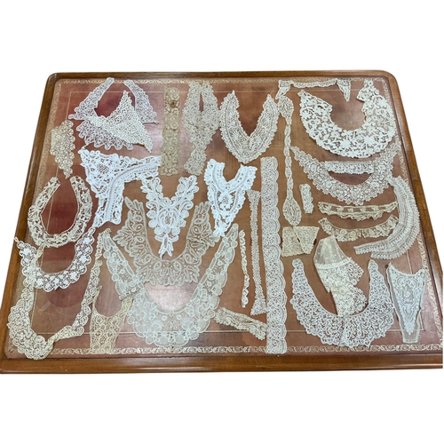 88 - A collection of 19th century hand made lace collars, frontiers (24), cuffs, trimming, including Brus... 