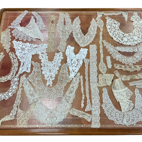 88 - A collection of 19th century hand made lace collars, frontiers (24), cuffs, trimming, including Brus... 