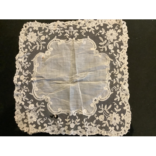 90 - 19th century lace etc; including a Brussels hand made lace wedding hankie, a white worked fine linen... 