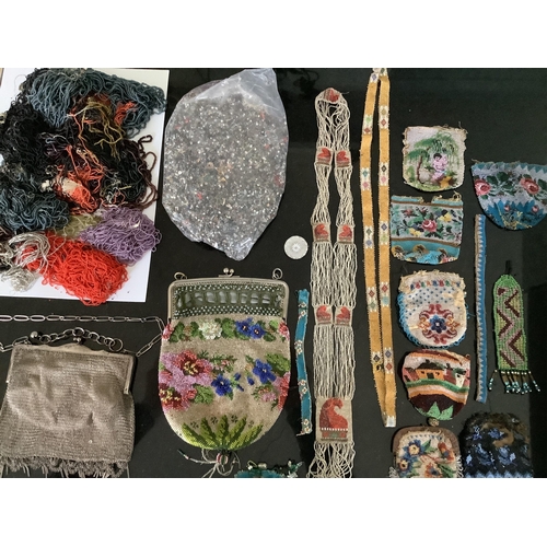 91 - A fine chain mail evening bag, a collection of early 19th century hand beaded purses, a similar bag ... 