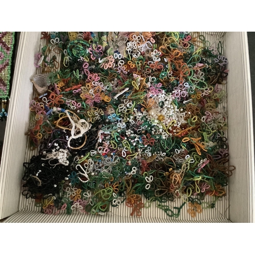 91 - A fine chain mail evening bag, a collection of early 19th century hand beaded purses, a similar bag ... 