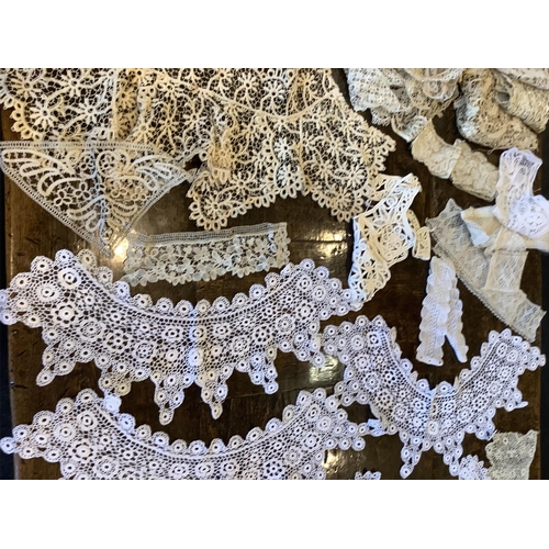 93 - A collection ten various sized Irish crochet collars- largest 94cm long, together with silk Maltese ... 