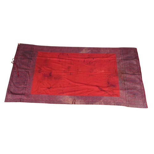 94 - A late 19th / early 20th century Kashmiri shawl, designed with bordered sides and wide decorative bo... 