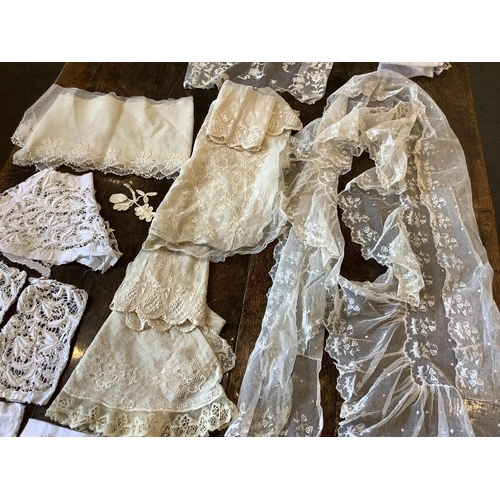 95 - Good for bridal, tv and film designers; a collection of mixed hand lace edged and white worked hanki... 