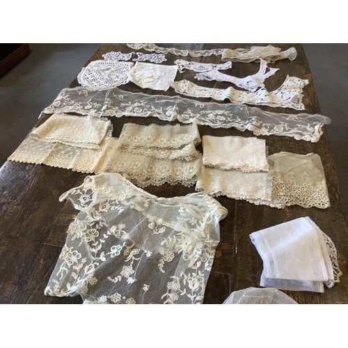 95 - Good for bridal, tv and film designers; a collection of mixed hand lace edged and white worked hanki... 