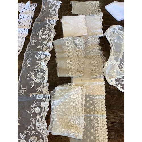 95 - Good for bridal, tv and film designers; a collection of mixed hand lace edged and white worked hanki... 
