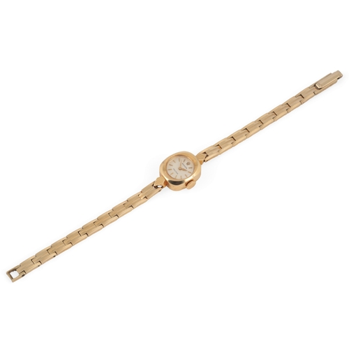 127 - A lady's 18k gold Rolex Precision manual wind wrist watch, on an associated 14k gold bracelet, with ... 