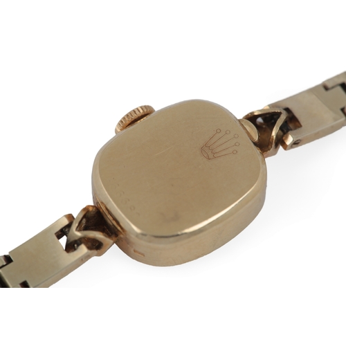 127 - A lady's 18k gold Rolex Precision manual wind wrist watch, on an associated 14k gold bracelet, with ... 