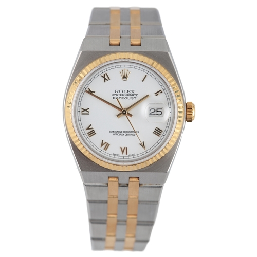 129 - A gentleman's late 1980's steel and gold Rolex Oyster Quartz Datejust wrist watch, on a Rolex steel ... 