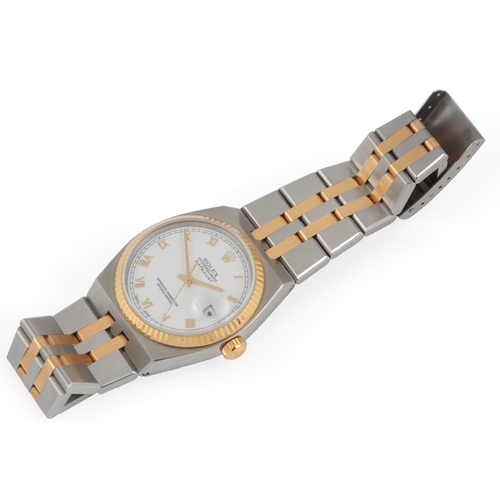 129 - A gentleman's late 1980's steel and gold Rolex Oyster Quartz Datejust wrist watch, on a Rolex steel ... 