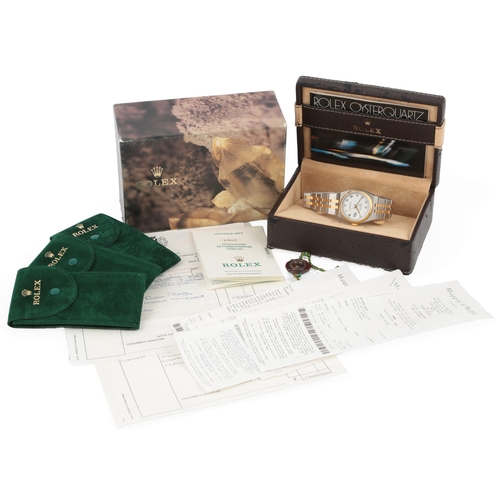 129 - A gentleman's late 1980's steel and gold Rolex Oyster Quartz Datejust wrist watch, on a Rolex steel ... 