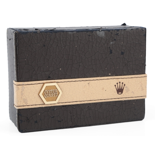 129 - A gentleman's late 1980's steel and gold Rolex Oyster Quartz Datejust wrist watch, on a Rolex steel ... 