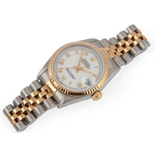 130 - A lady's late 1990's steel and gold Rolex Oyster Perpetual Datejust wrist watch, on a Rolex steel an... 