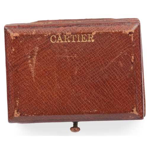136 - Cartier New York, a gilt tooled leather box, early 20th century, in tooled brown leather, lined in c... 