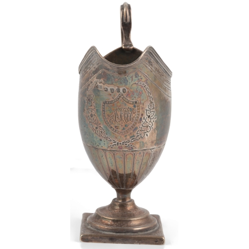 33 - A George III silver helmet shaped pedestal cream jug, by Soloman Hougham, with reeded loop handle an... 