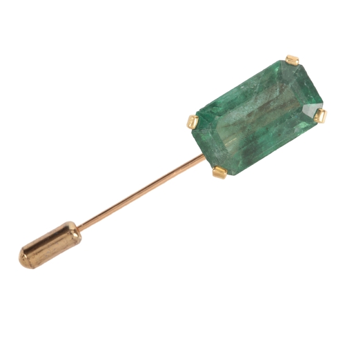 592 - An emerald stick pin, France, claw-set with a step-cut emerald measuring approximately 19.8 x 11.4 x... 