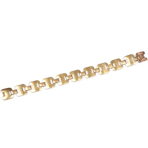 600 - Georges Lenfant, a gold bracelet, France, mid 20th century, composed of geometric links, to a concea... 