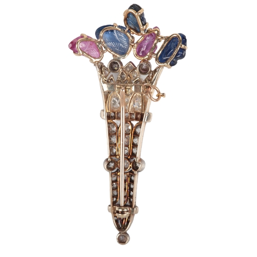 611 - An attractive sapphire, ruby and diamond brooch, late 19th century and later, designed as a bouquet,... 