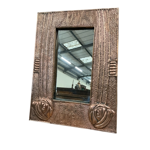 2070 - A Glasgow school style hammered copper mirror, late 20th century, inscribed 1904 and The Willow. wid... 