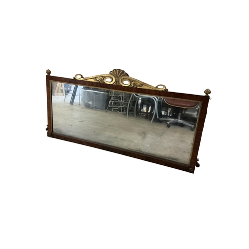 2073 - A Regency style rosewood and parcel gilt overmantel mirror, width 137cm, height 67cm