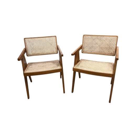 2075 - A pair of Pierre Jeanneret style caned teak armchairs, width 58cm, depth 55cm, height 79cm