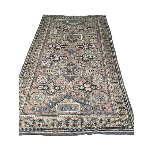 2079 - An antique Tekke rug fragment, 144 x 123cm and a machined Caucasian style panel, 253 x 138cm