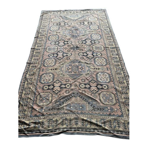 2079 - An antique Tekke rug fragment, 144 x 123cm and a machined Caucasian style panel, 253 x 138cm